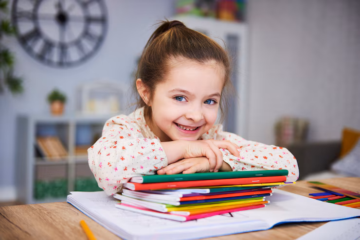 smiling-girl-studying-home_329181-18968